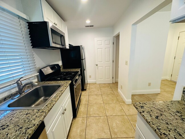 Photo - Come View This Perfect 2 Bedroom 1 Bath Located In the Heart of Downtown!!