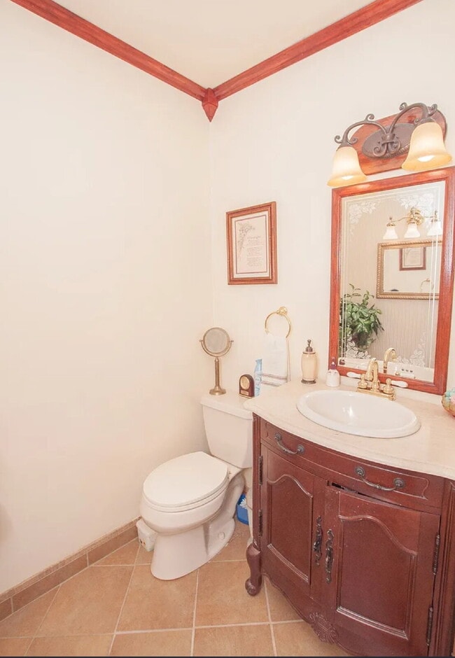 Photo - "Charming 2-Bed Home with Spacious 1700 Sq Ft Layout, FENCED yard!"