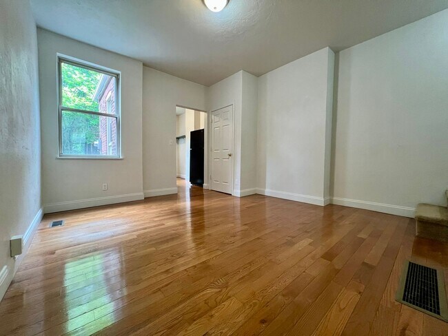 Photo - Lovely Two Bedroom Townhome with Hardwood Floors throughout! Washer & Dryer Provided!