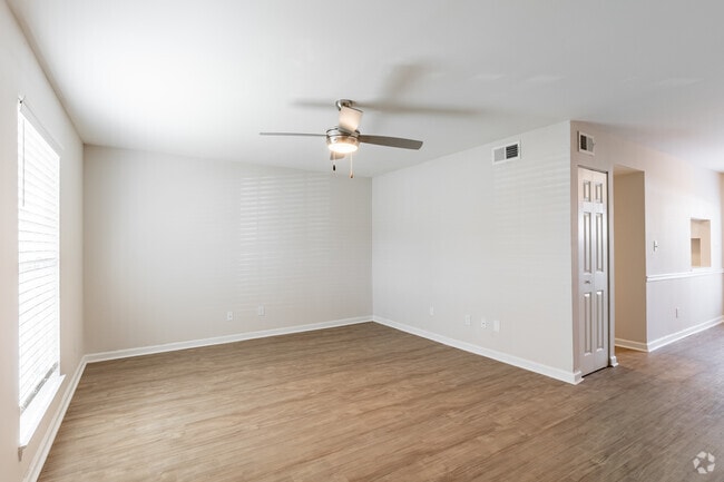 2BR, 2.5BA - 1314SF Living Room - The Hills at Fairington