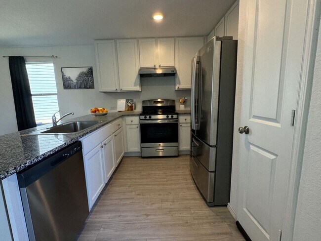 Photo - Like new 4/2.5 home (2023) in Morgan Heights with loft and big yard
