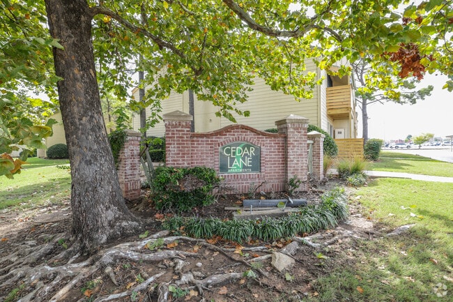 Sign - Cedar Lane Apartments