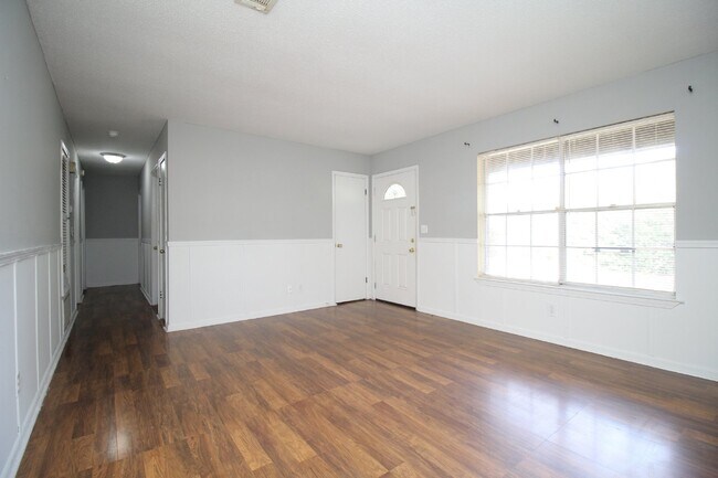 Photo - Spacious 3BR/1.5BA Home in Pace with Open Living Area, Tiled Family Room, and Fenced Backyard – M...