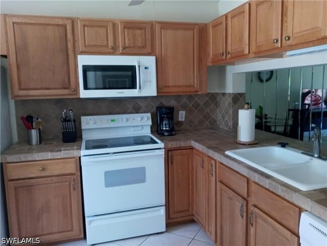 Photo - 3001 Sandpiper Bay Cir Unit B106