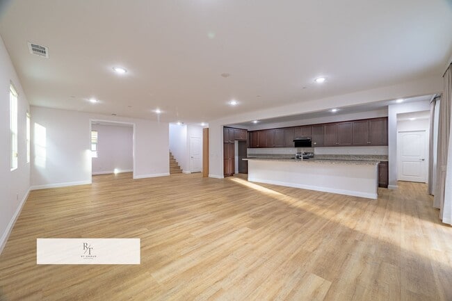 Photo - Bright & Spacious 4-Bedroom Home with Open Living Spaces