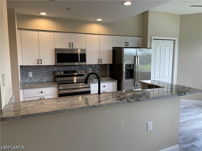 Building Photo - 3780 Sawgrass Way Unit 3327
