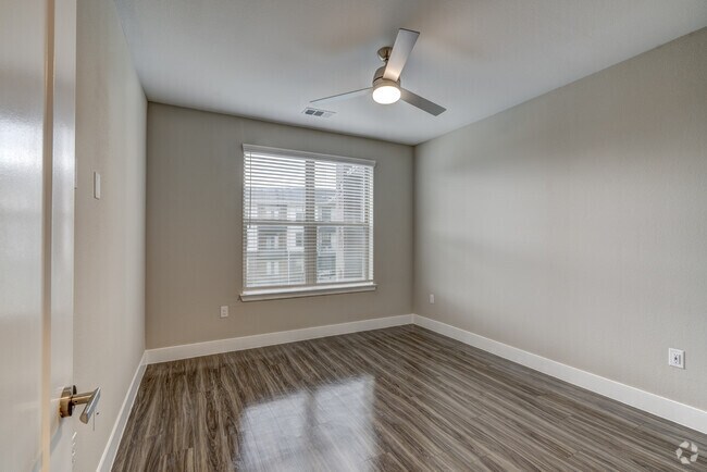 1BR, 1BA - 1,058SF - Primary Bedroom