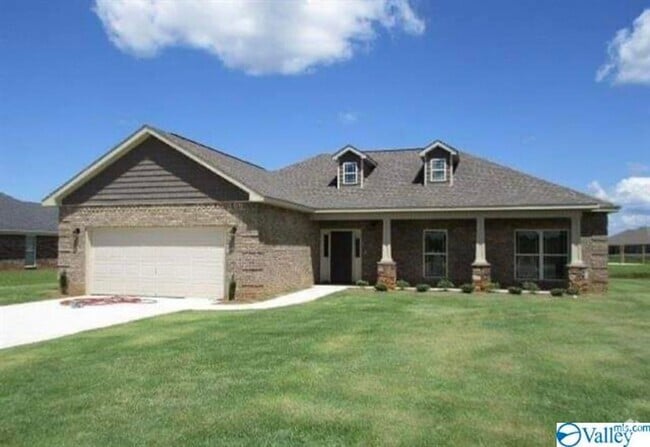 Building Photo - LIKE NEW! FOUR BEDROOM BRICK HOME IN HAZE...