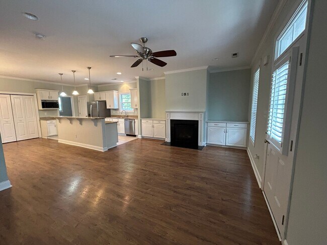 Photo - Enjoy private living in this beautiful 3 bedroom, 2.5 bathroom home on almost half acre lot!