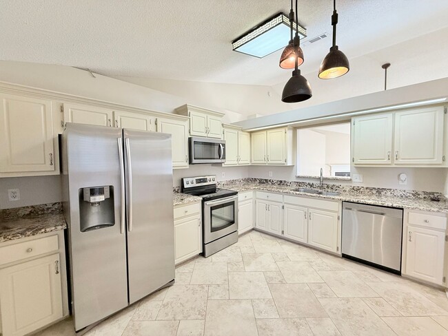 Photo - Spacious 3-Bedroom Home - Ideal Location