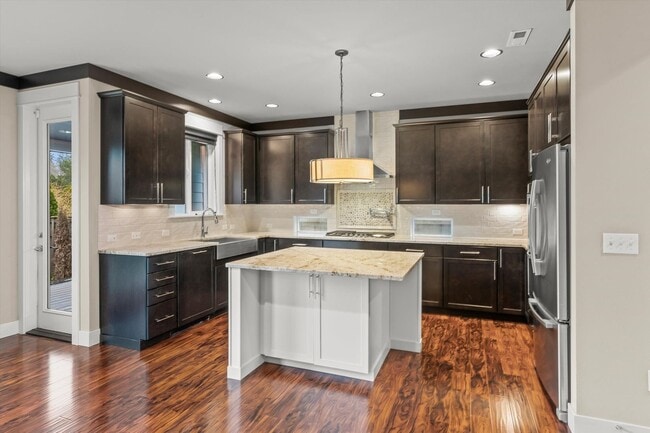 Photo - Backyard Putting Green + Outdoor Fireplace | Comfortable Puyallup Rental