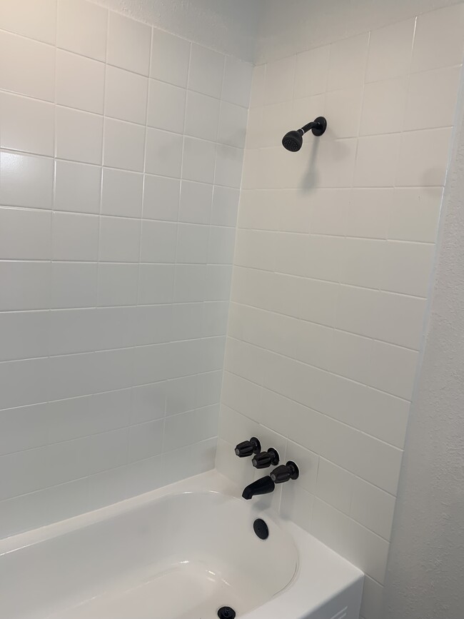 Renovated Bathtubs - Costa Bella Apartments