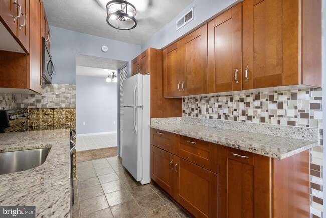 Photo - 7812 Hanover Pkwy Apartment Unit 201