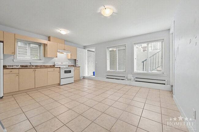 Photo - Bright 2-Bedroom Basement Suite in Desirable Sullivan Neighbourhood – Utilities Included Unit Basement