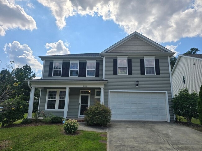 Building Photo - Spacious 4BR, 2.5BA Home with Screened Pat...