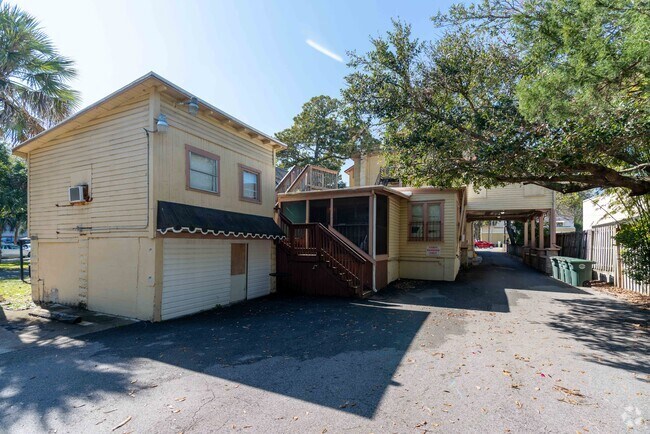 Property Rearview & Covered Carport - Legacy Daytona Multifamily