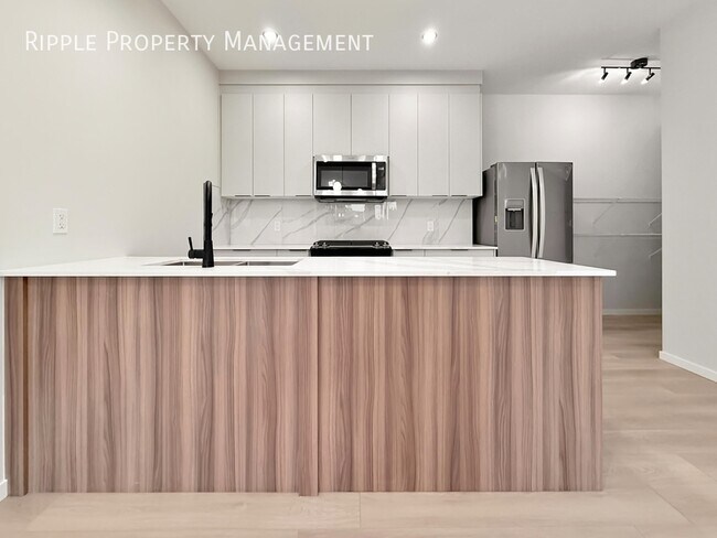 Photo - Modern 2 Beds, 2.5 Baths Main Floor/ Upper | No Pets Allowed