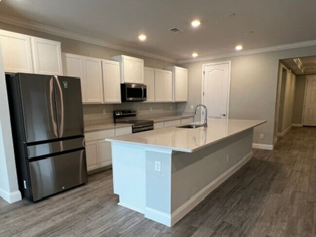 Photo - FOUR BEDROOMS and THREE BATHS For Rent