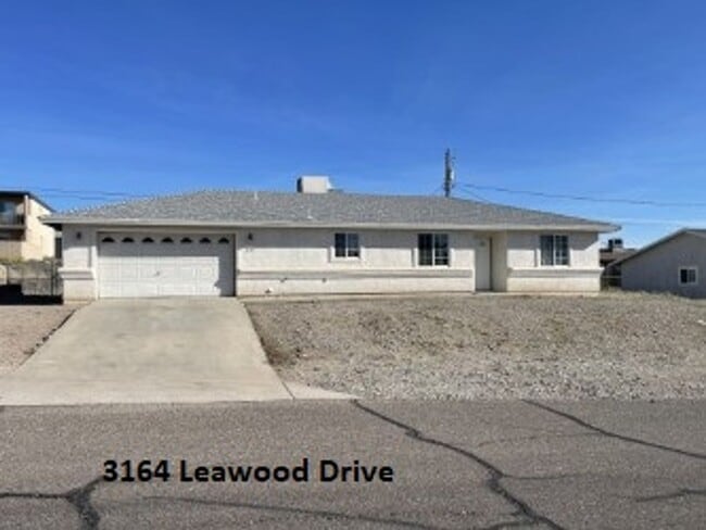 Building Photo - North side home, pet friendly with fenced back yard.
