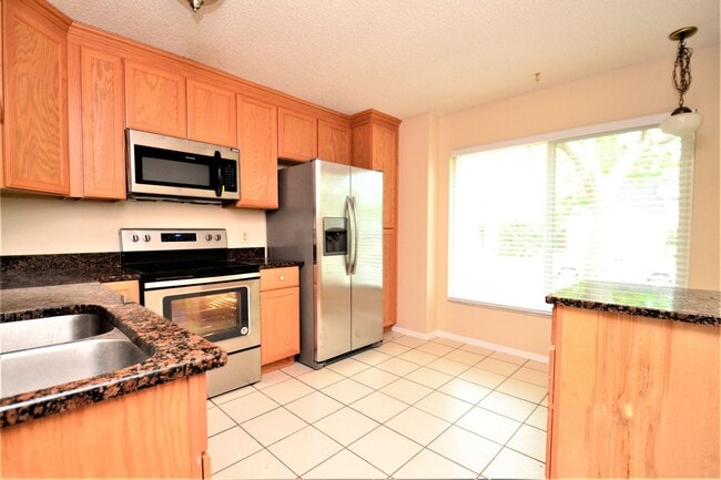 Photo - Upgraded Oviedo Home - Screened porch, fenced back yard, wood floors