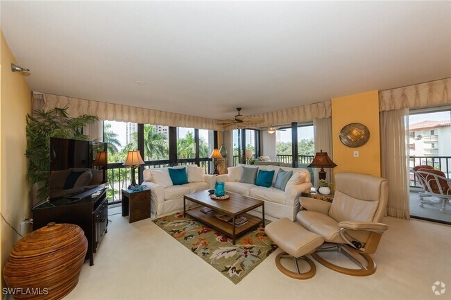 Building Photo - 6000 Pelican Bay Blvd Unit C-204 Rental