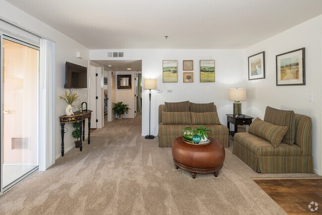 2BR, 2BA - 764SF - Living Room - Carefree Senior (55+) Living at North Natomas