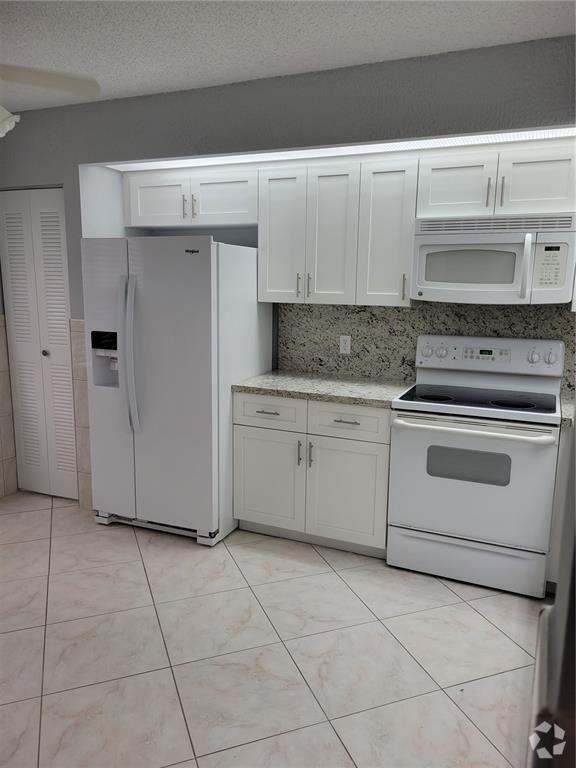 Building Photo - 1300 SW 125th Ave Unit 310K Rental