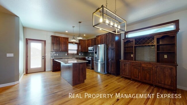 Photo - Beautiful 4 Bed 3.5 Bath House with 3-stall attached garage and fenced backyard on West side