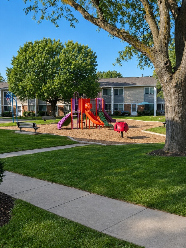 Outdoor Playground Area at Sunset Ridge - Sunset Ridge Townhomes