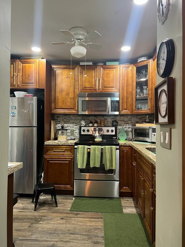 Building Photo - 1599 NW 43rd Ave Unit 106