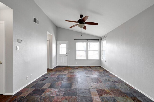 Photo - Carpet-Free Home with High Ceilings & Outdoor Retreat
