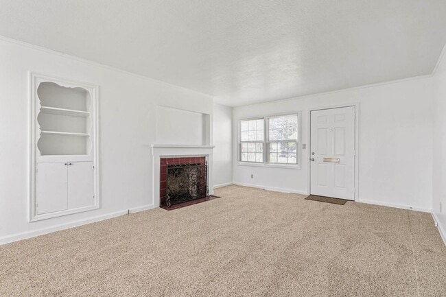 Photo - Beautifully maintained 1-bdrm/1-bath unit in 4-plex. Fireplace, off-street parking, laundry, grea... Unit 1912