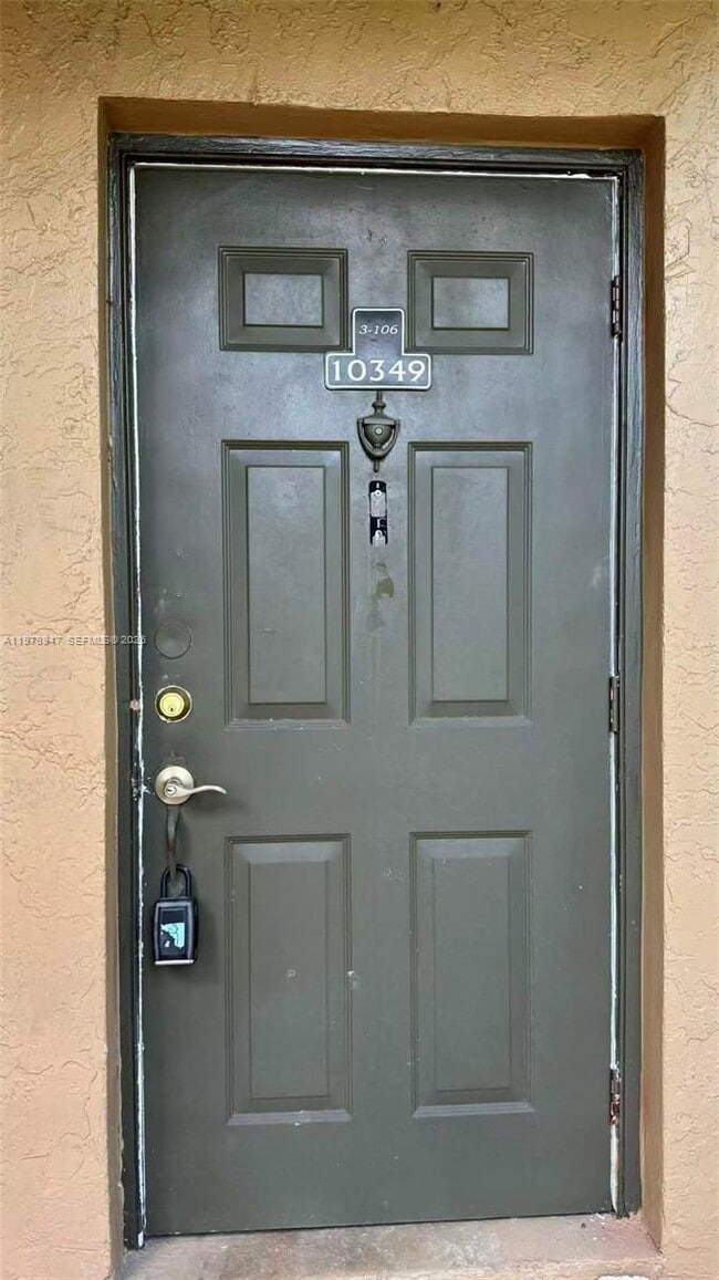 Building Photo - 10349 NW 8th St Unit 106