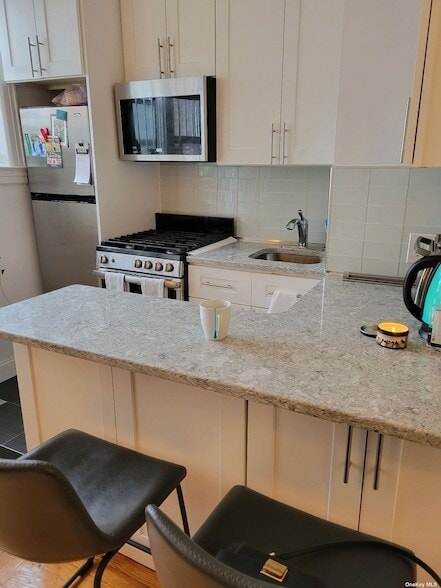 Photo - 43-33 46th St Unit F-7