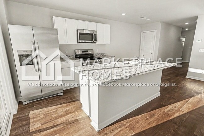Photo - 87 River Rock St