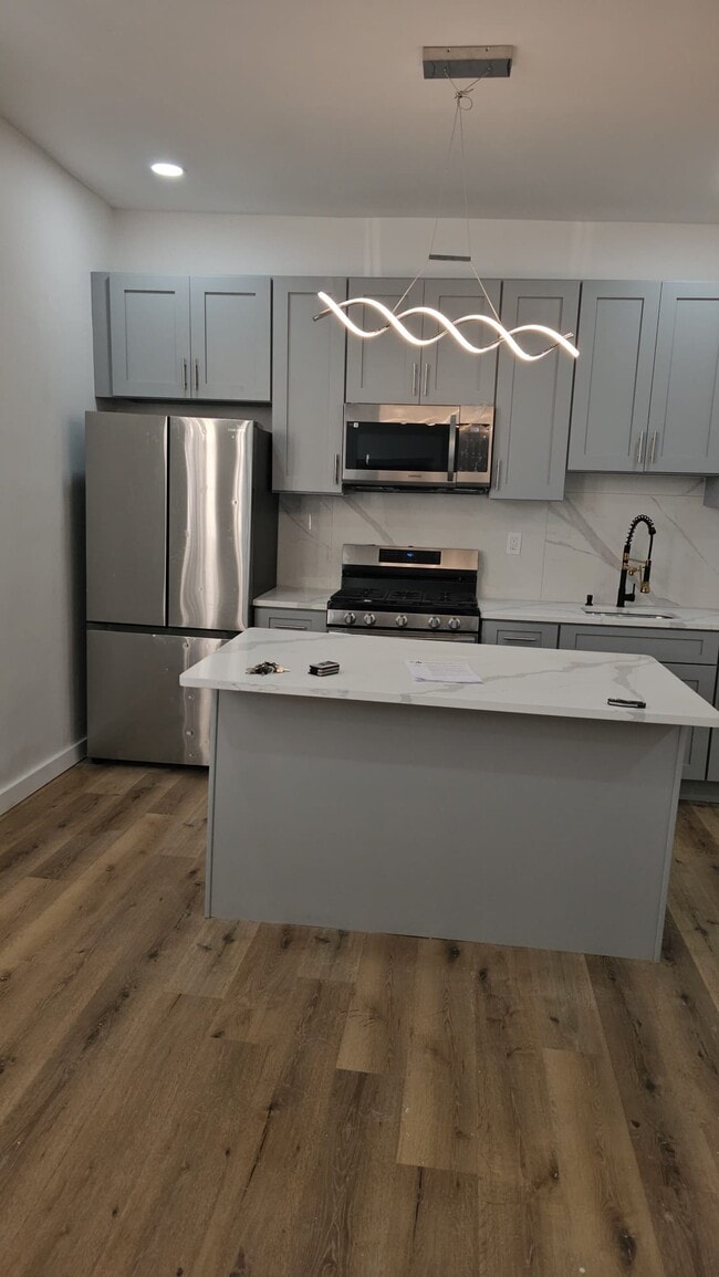 Building Photo - Estate of N 60th street Unit 3
