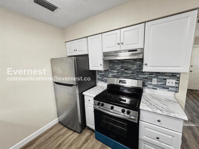 Photo - 2 Bed/1 Bath Townhome with Off-Street Parking / Pet-Friendly / Available Now!