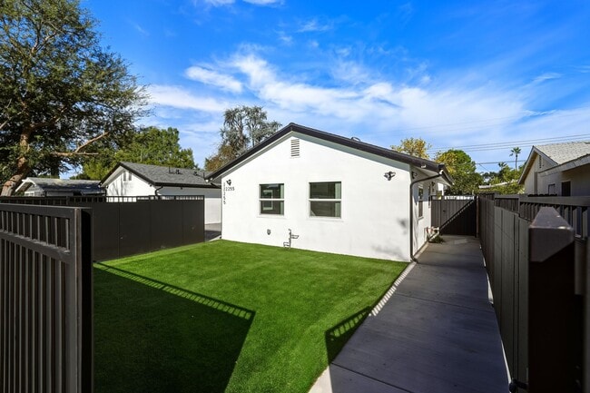 Building Photo - Newly Rebuilt Luxury 3 Bed Home with Pool, Designer Kitchen, Huge Courtyard, Near Topanga Mall