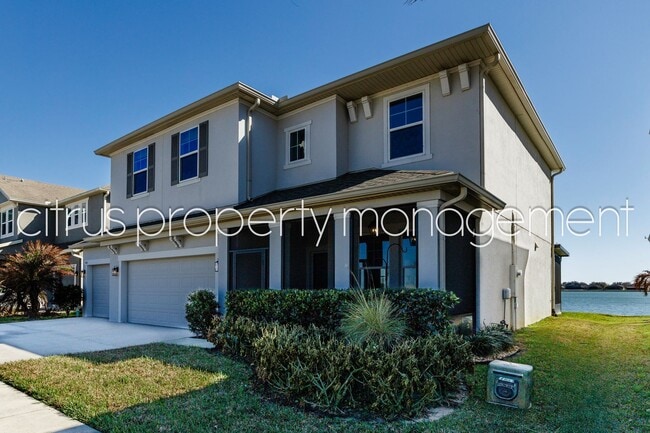 Photo - Stunning Double Waterfront 4/3 Home with Dock and Electric Boat Lift