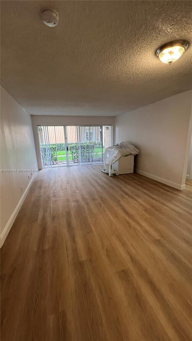 Photo - 8851 Wiles Rd Unit 108