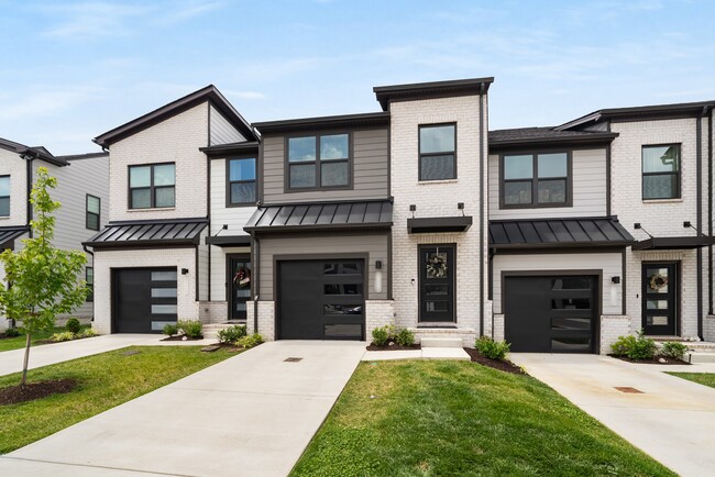 House Exterior - 1121 Riverbrook Dr Townhome