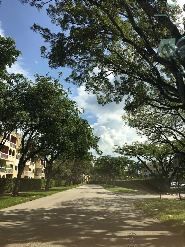 Building Photo - 7815 Camino Real Unit I202