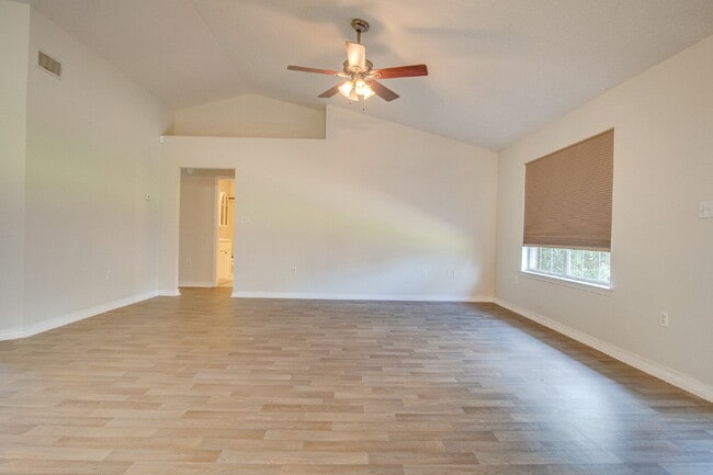 Navarre 4BR, 2BA Home with Open Floor Plan, Split Bedrooms, Wood-Look Flooring, 2-Car Garage & Fe...