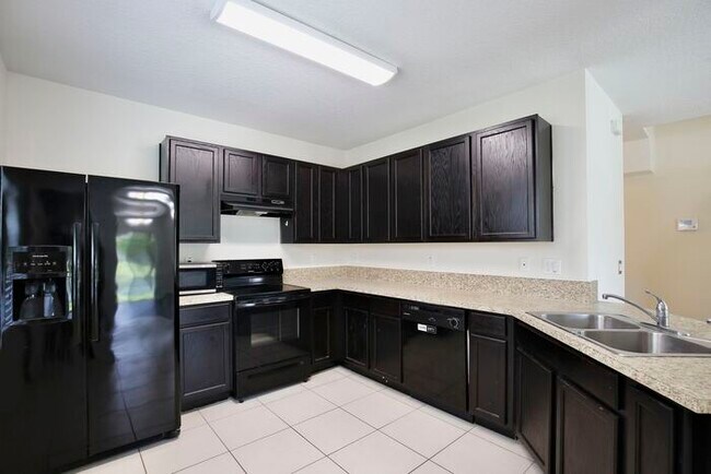 Photo - Spacious 3/2.5 Townhome with a 2 Car Garage and a Beautiful Pond View in Westwood Condos - Orlando!