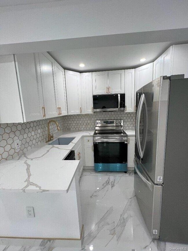 Photo - 730 E 217th St Unit 1