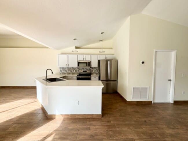 Photo - Stunning 4 Bedroom, 2 Bath Home with HUGE Patio &amp; Backyard