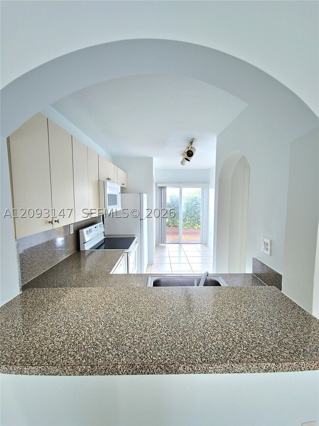 940 NE 33rd Terrace Unit 102