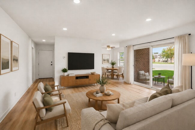 Living room with LED lighting and patio/balcony access