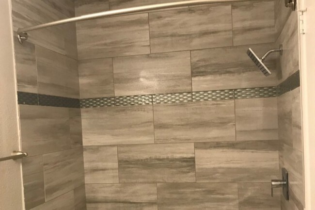 New tubs/tile - Cedars at Ellington