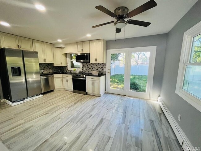 Photo - 200 Hicksville Rd Townhome